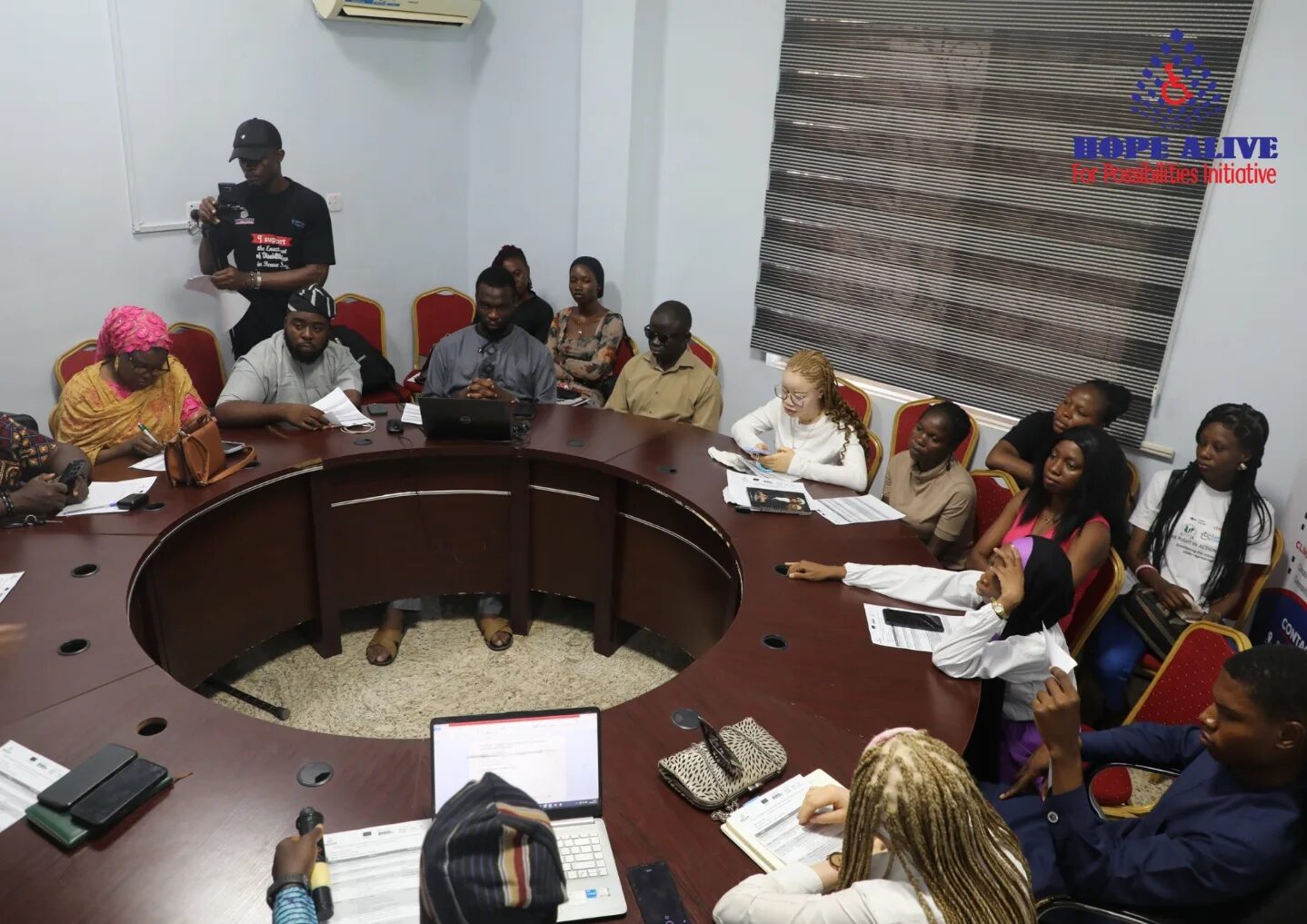 Youths with disabilities participating in a climate change roundtable dialogue organized by HAPI in Nigeria